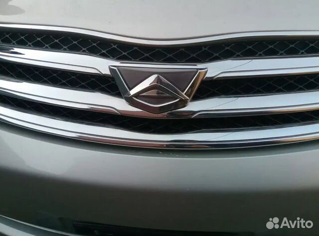 Эмблема решётки радиатора Toyota Allion