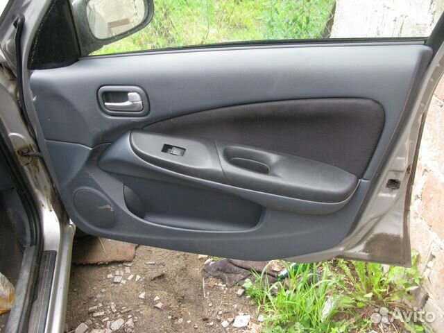 Обшивка двери передней правой Nissan Almera N16