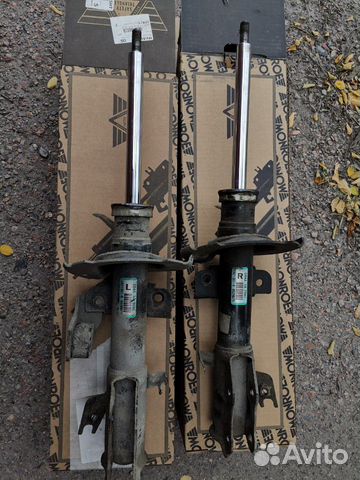 Передние стойки Mazda 2