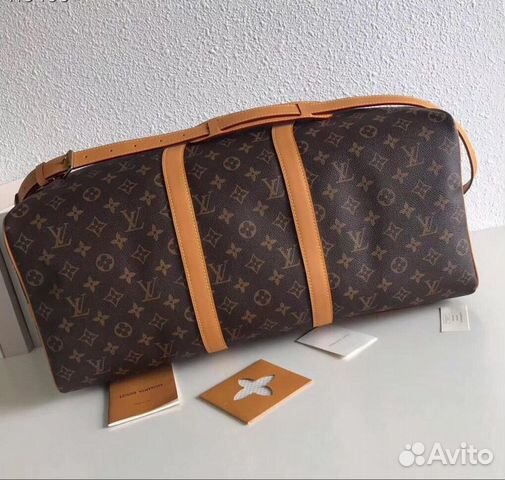 Новая дорожная сумка кожа бренд Louis Vuitton Новая дорожная сумка кожа бренд Louis Vuitton