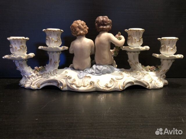 Фарфоровый подсвечник Putti Capodimonte Фарфоровый подсвечник Putti Capodimonte