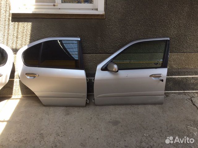 Двери нисан примьера p11