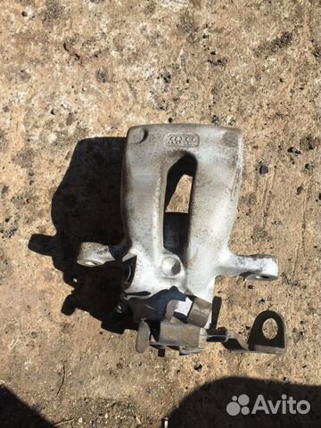 Задний тормозной цилиндр левый на Опель