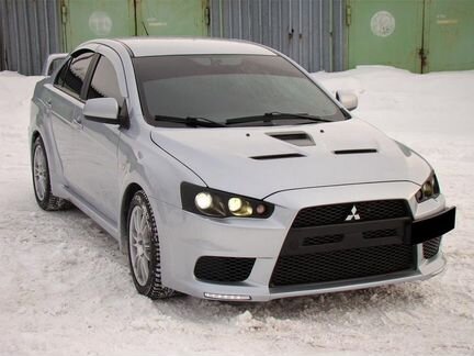 Капот в стиле EVO Mitsubishi Lancer X