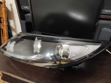 Фара левая KIA Sportage 3