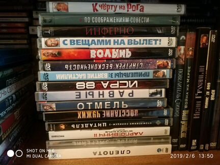 Фильмы DVD б/у 500 шт оптом