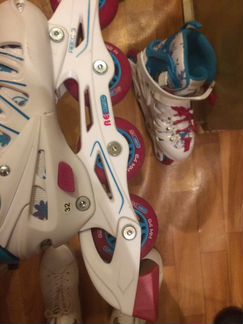 Роликовые коньки