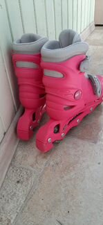 Роликовые коньки